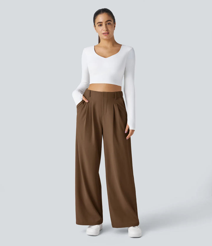Pantalon fluide à taille haute et jambes larges, en tissu gaufré, avec poches latérales