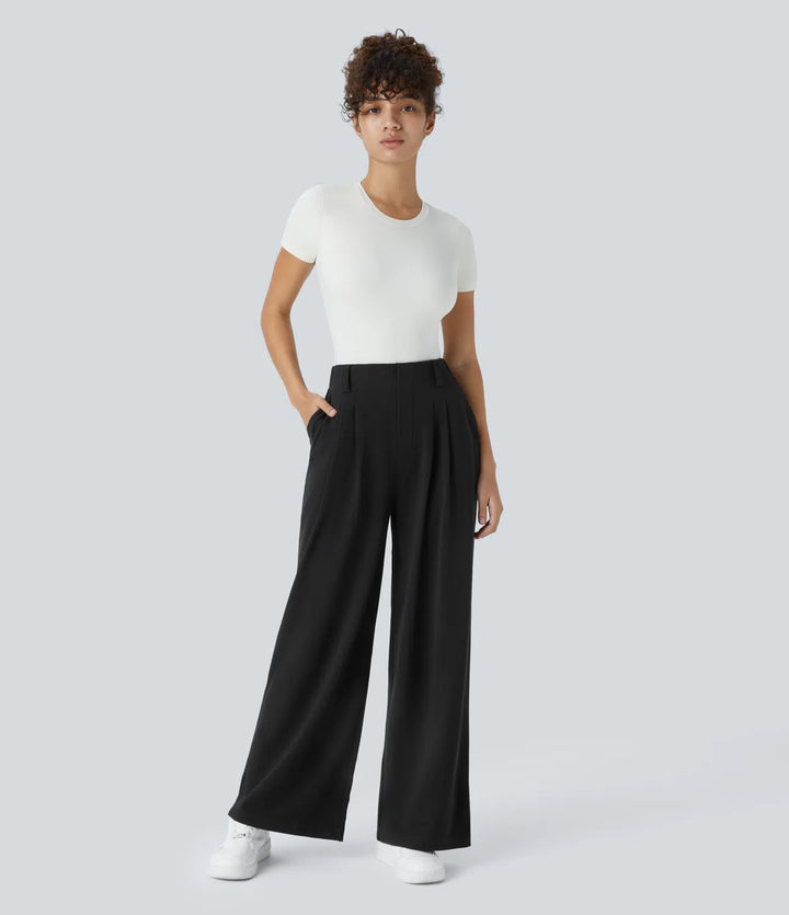 Pantalon fluide à taille haute et jambes larges, en tissu gaufré, avec poches latérales