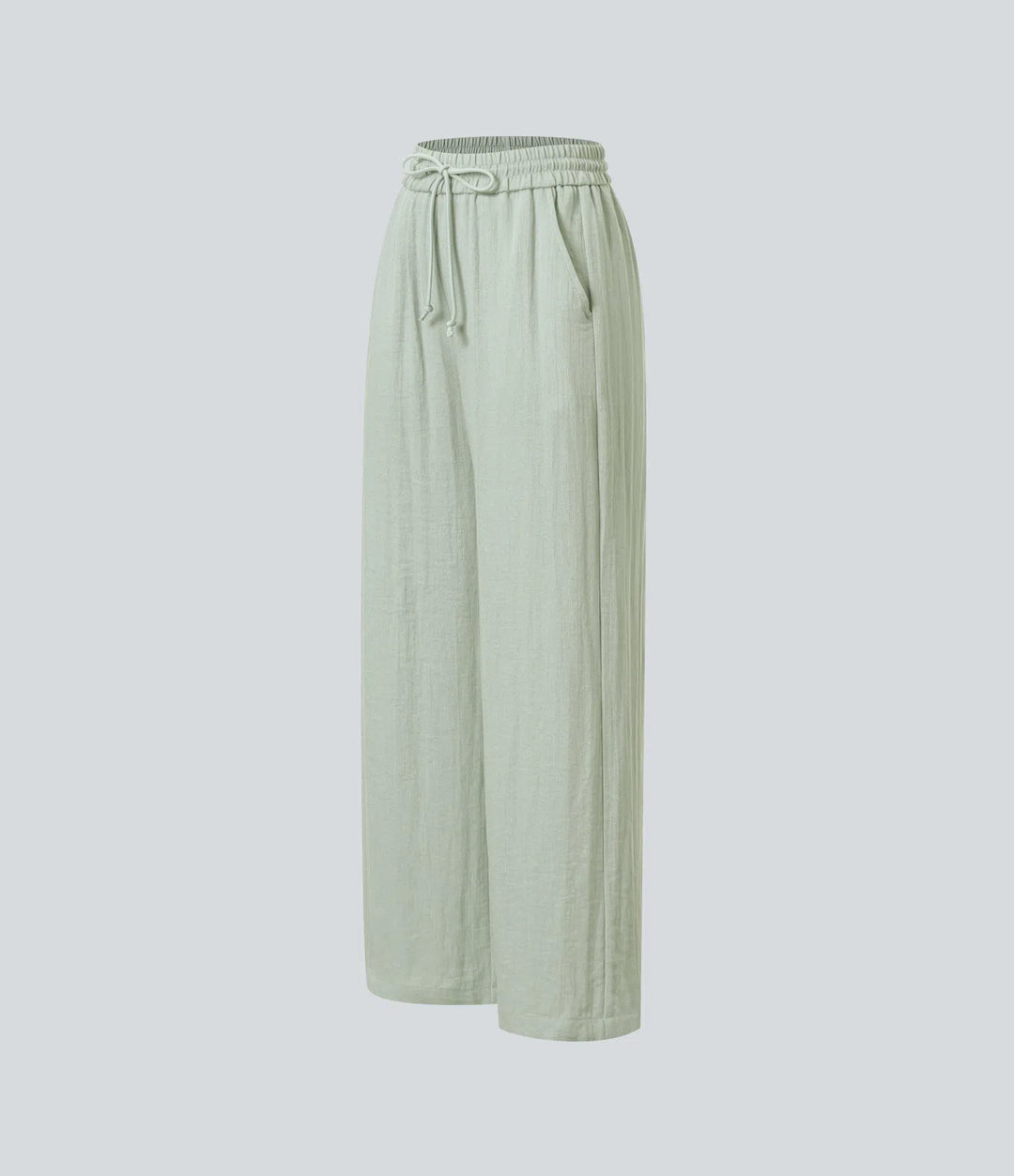 Pantalon large fluide taille haute avec cordon de serrage, poches latérales et aspect lin
