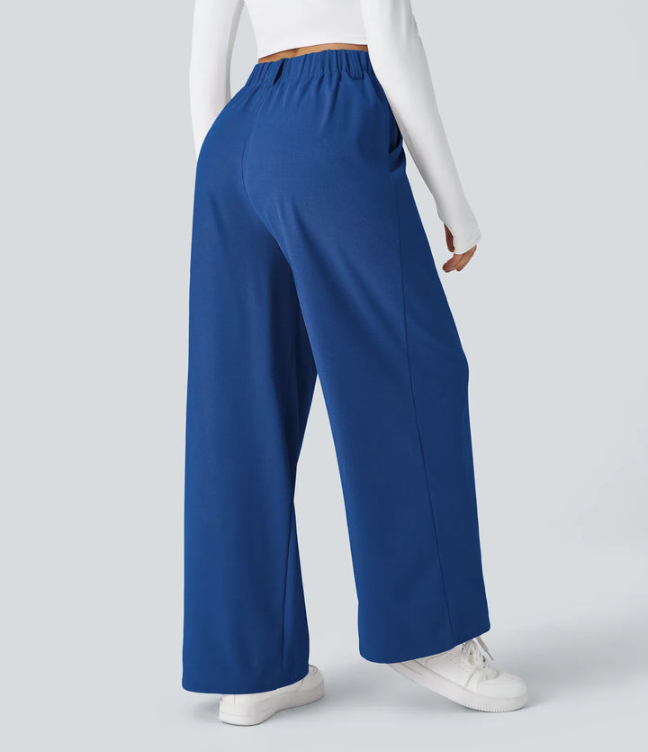 Pantalon fluide à taille haute et jambes larges, en tissu gaufré, avec poches latérales