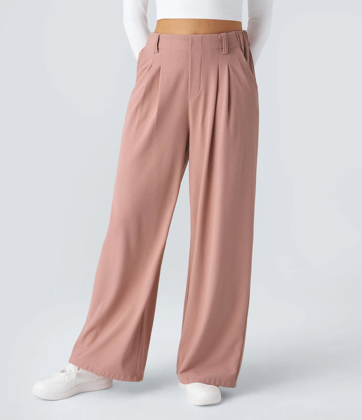 Pantalon fluide à taille haute et jambes larges, en tissu gaufré, avec poches latérales
