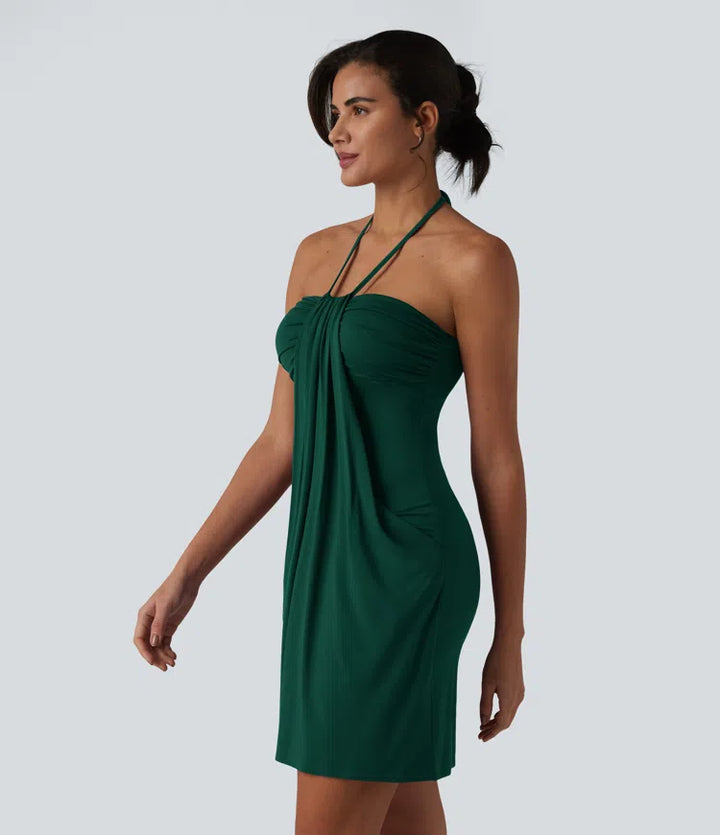 Robe resort mini dos nu à col licou avec lien noué dans le dos et poches