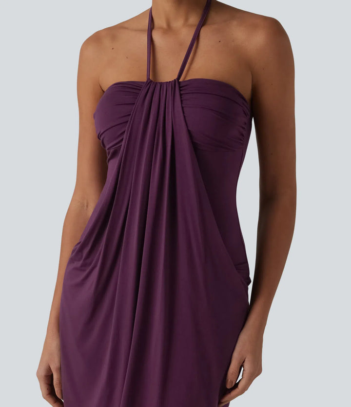 Robe resort mini dos nu à col licou avec lien noué dans le dos et poches