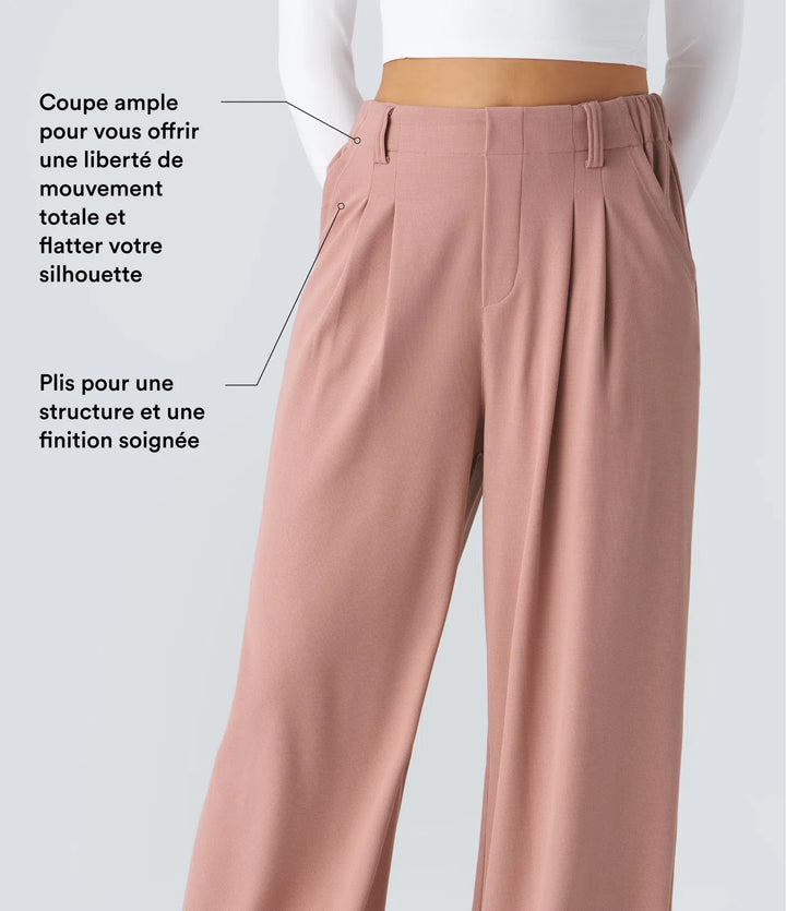 Pantalon fluide à taille haute et jambes larges, en tissu gaufré, avec poches latérales