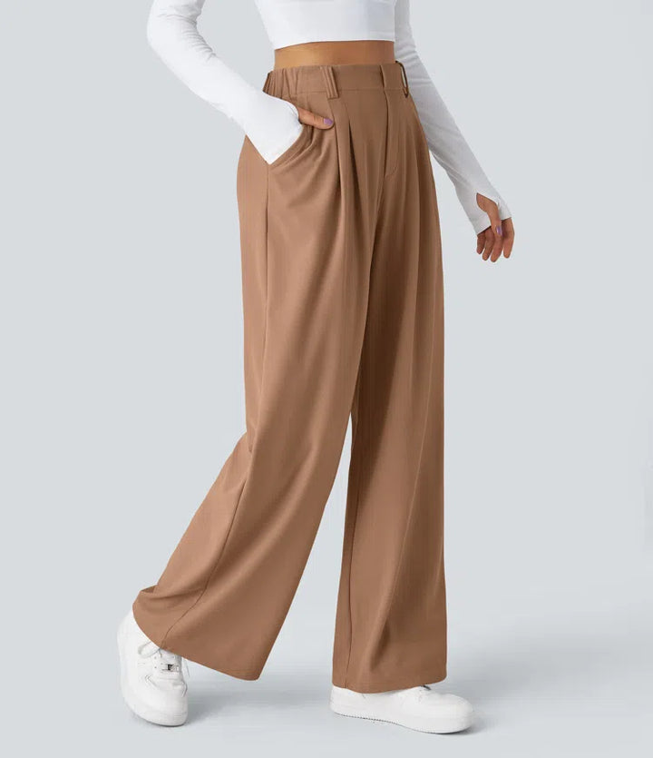 Pantalon fluide à taille haute et jambes larges, en tissu gaufré, avec poches latérales