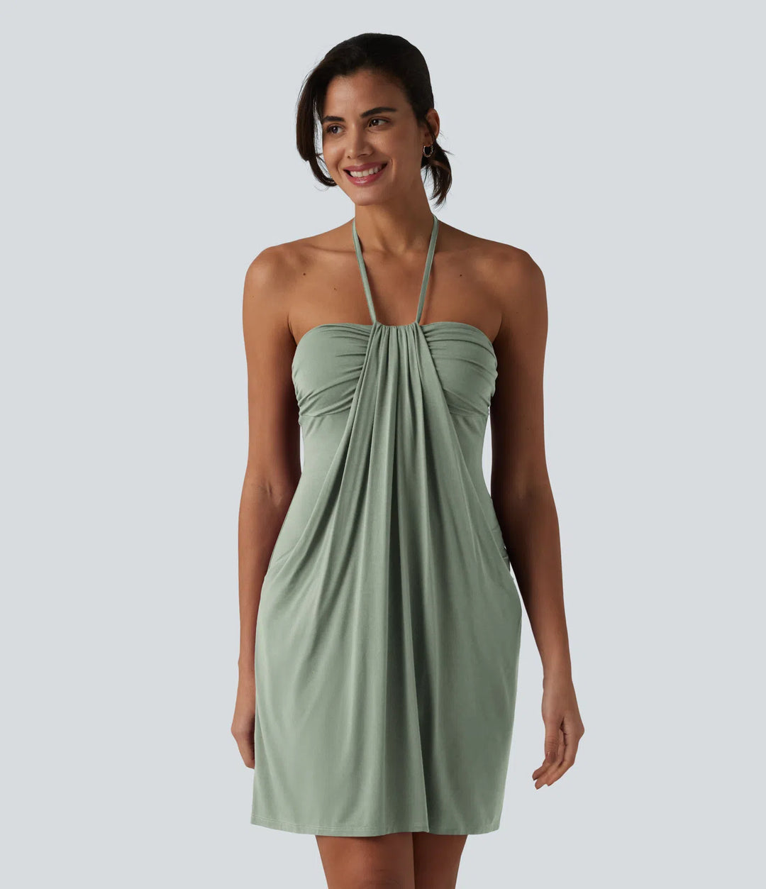Robe resort mini dos nu à col licou avec lien noué dans le dos et poches