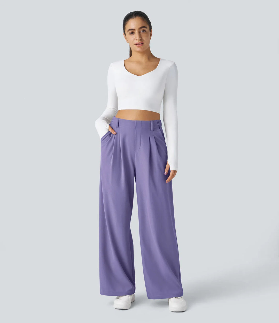 Pantalon fluide à taille haute et jambes larges, en tissu gaufré, avec poches latérales