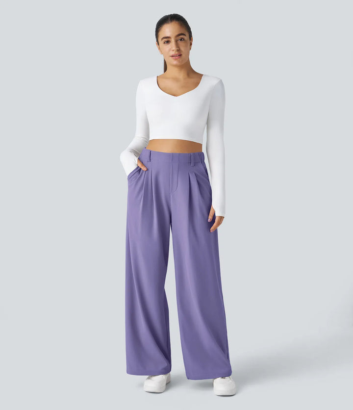 Pantalon fluide à taille haute et jambes larges, en tissu gaufré, avec poches latérales