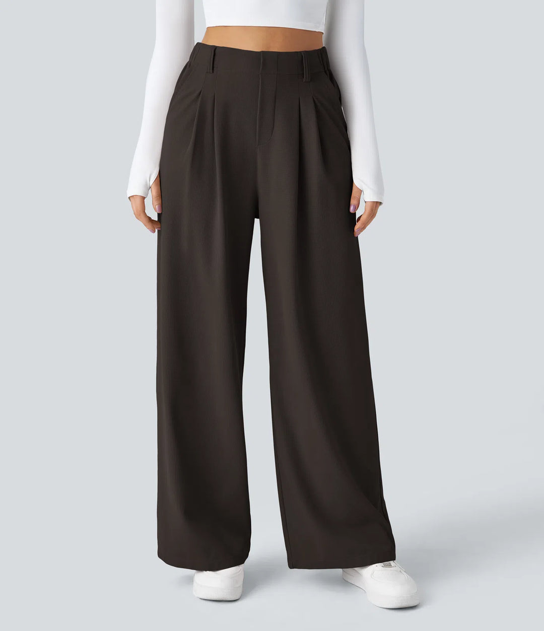 Pantalon fluide à taille haute et jambes larges, en tissu gaufré, avec poches latérales