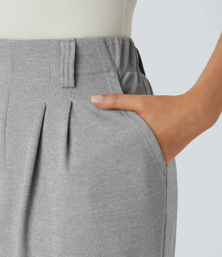 Pantalon fluide à taille haute et jambes larges, en tissu gaufré, avec poches latérales