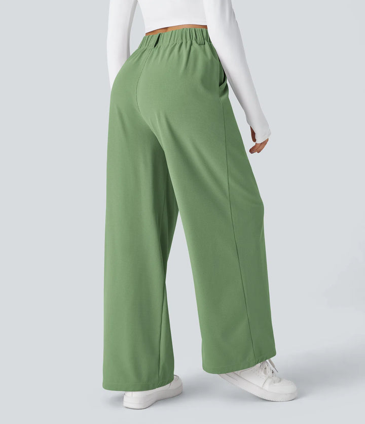 Pantalon fluide à taille haute et jambes larges, en tissu gaufré, avec poches latérales
