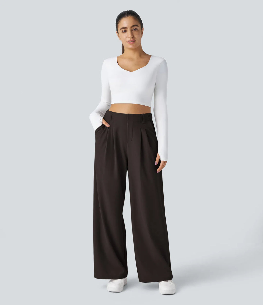 Pantalon fluide à taille haute et jambes larges, en tissu gaufré, avec poches latérales