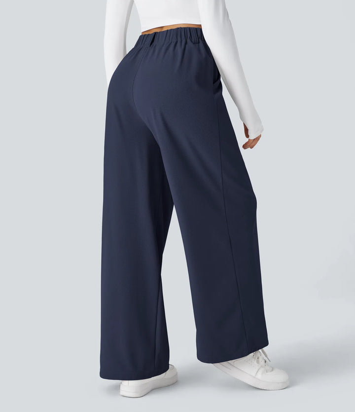 Pantalon fluide à taille haute et jambes larges, en tissu gaufré, avec poches latérales
