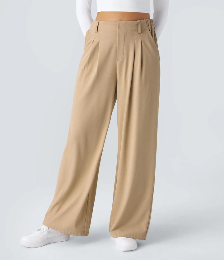 Pantalon fluide à taille haute et jambes larges, en tissu gaufré, avec poches latérales