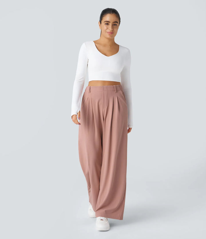 Pantalon fluide à taille haute et jambes larges, en tissu gaufré, avec poches latérales