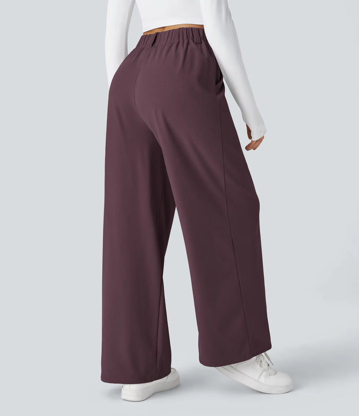 Pantalon fluide à taille haute et jambes larges, en tissu gaufré, avec poches latérales