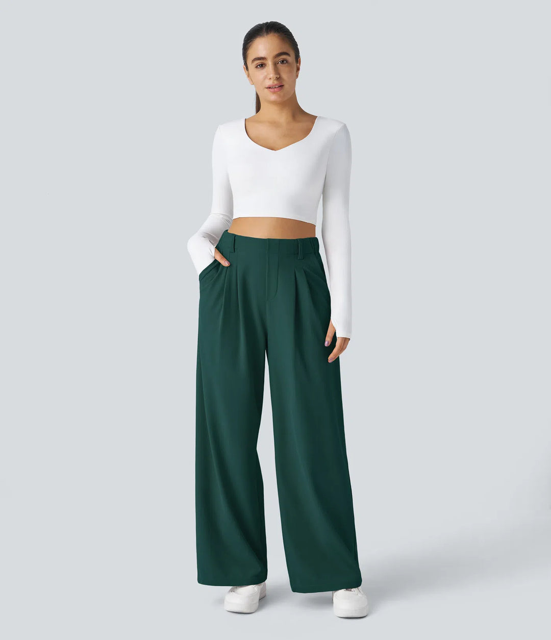 Pantalon fluide à taille haute et jambes larges, en tissu gaufré, avec poches latérales