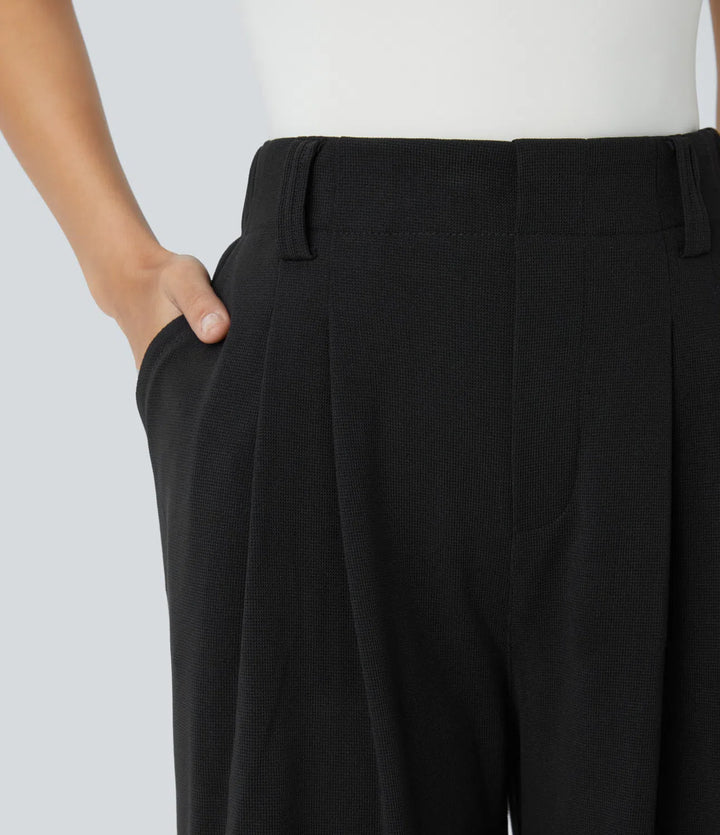 Pantalon fluide à taille haute et jambes larges, en tissu gaufré, avec poches latérales