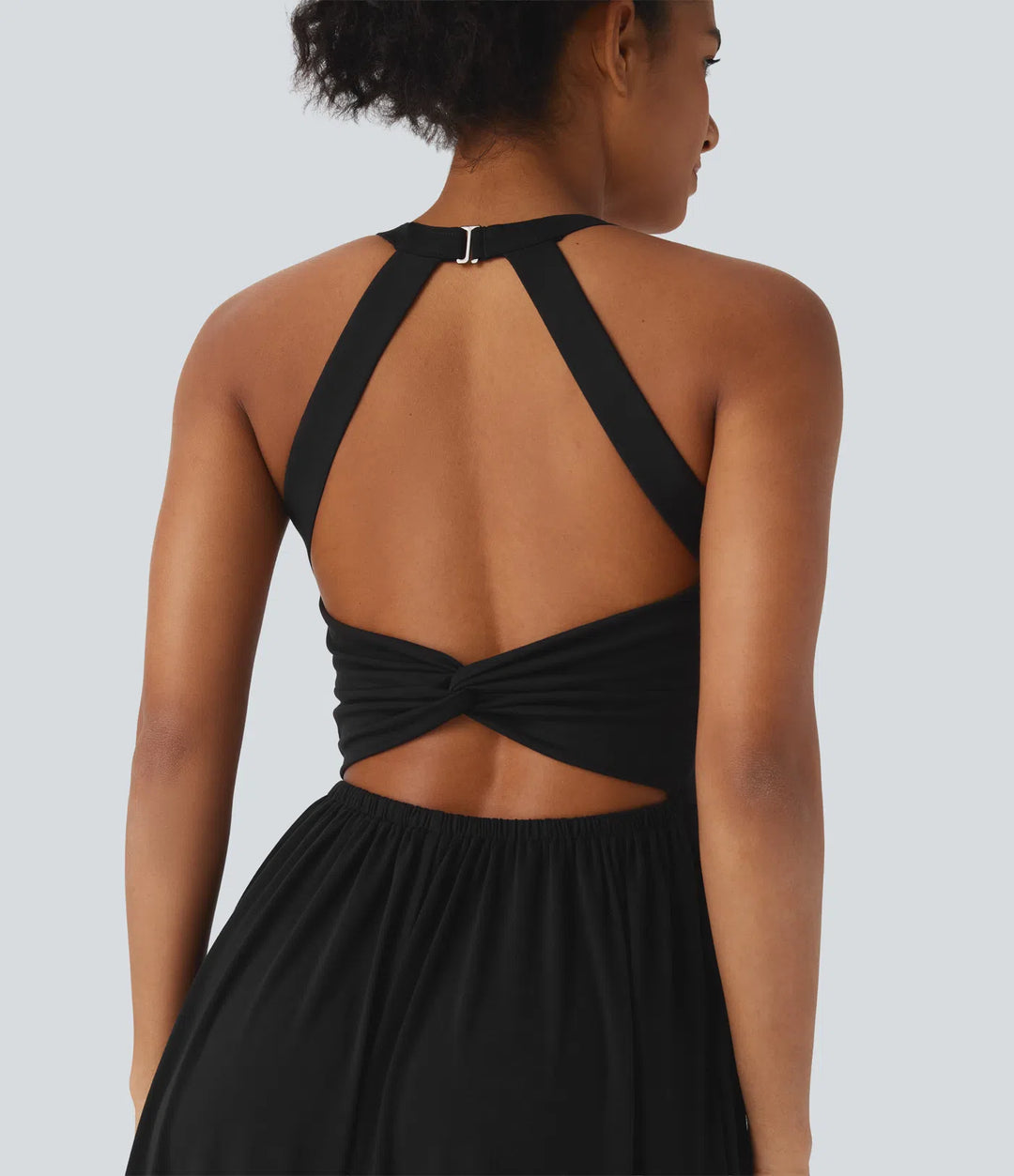 Robe longue fluide fendue avec poches latérales, dos nu et effet torsadé