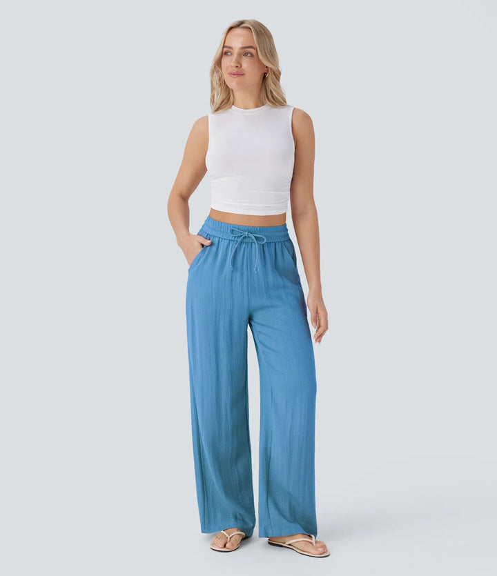 Pantalon large fluide taille haute avec cordon de serrage, poches latérales et aspect lin