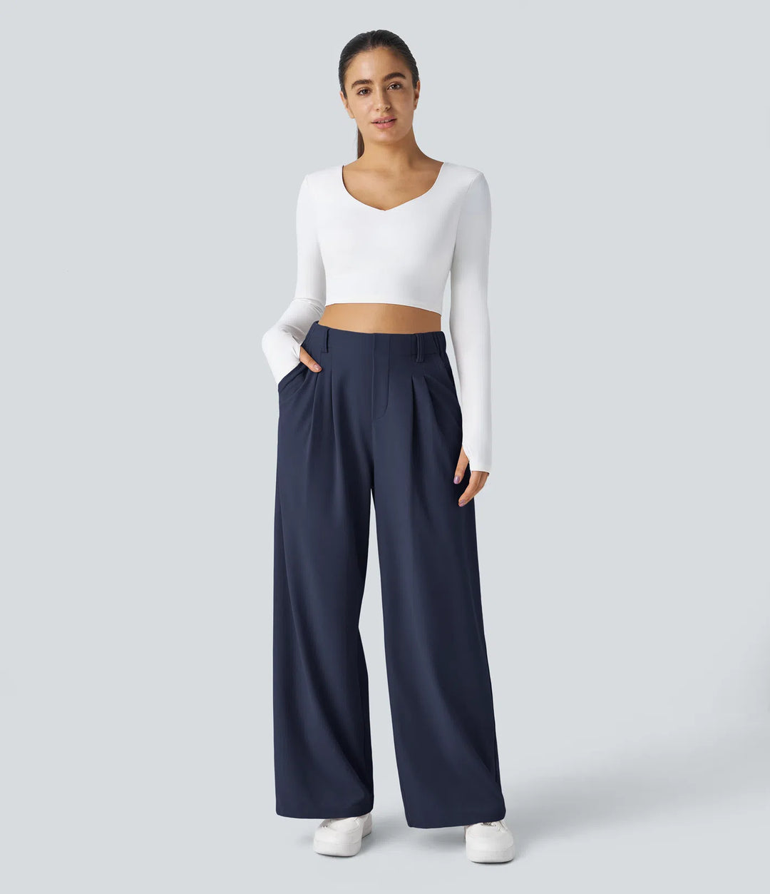 Pantalon fluide à taille haute et jambes larges, en tissu gaufré, avec poches latérales