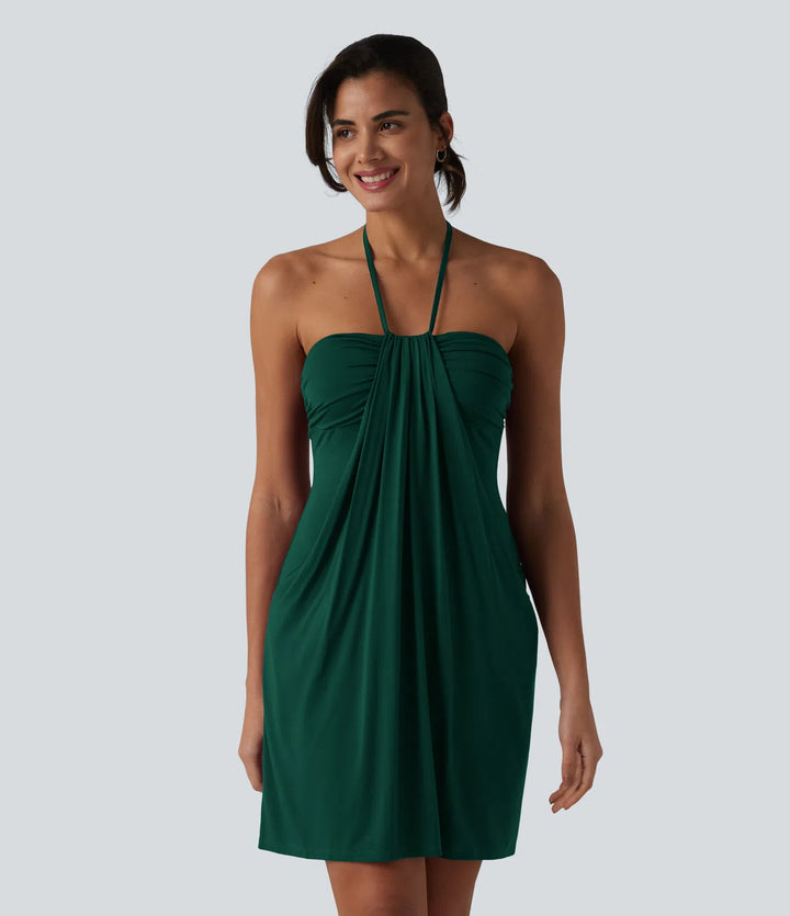 Robe resort mini dos nu à col licou avec lien noué dans le dos et poches