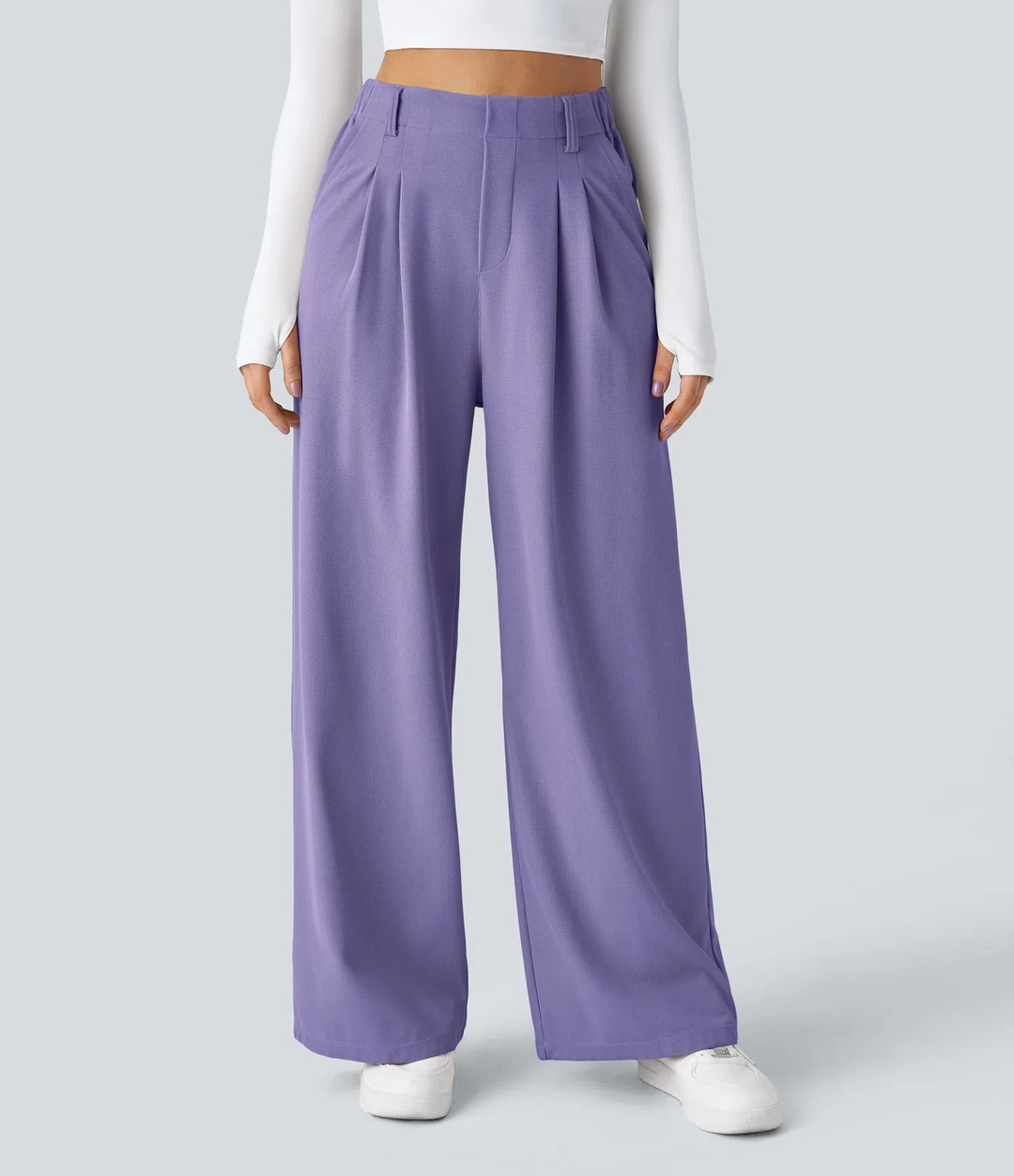 Pantalon fluide à taille haute et jambes larges, en tissu gaufré, avec poches latérales