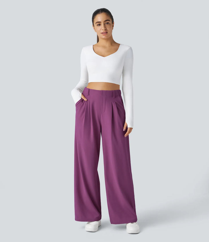 Pantalon fluide à taille haute et jambes larges, en tissu gaufré, avec poches latérales