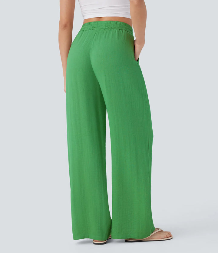Pantalon large fluide taille haute avec cordon de serrage, poches latérales et aspect lin