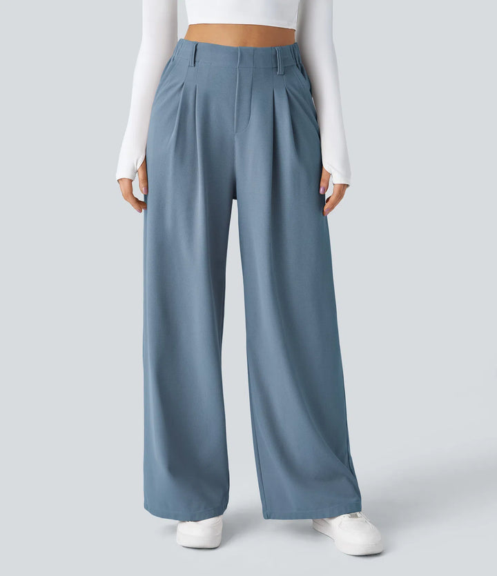 Pantalon fluide à taille haute et jambes larges, en tissu gaufré, avec poches latérales