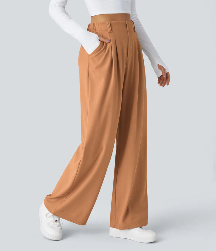 Pantalon fluide à taille haute et jambes larges, en tissu gaufré, avec poches latérales