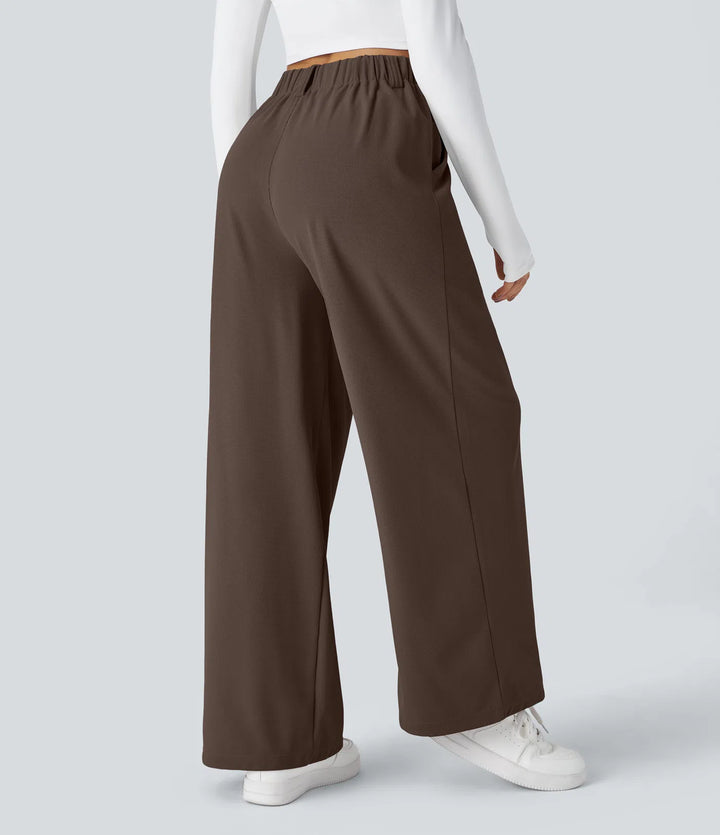 Pantalon fluide à taille haute et jambes larges, en tissu gaufré, avec poches latérales