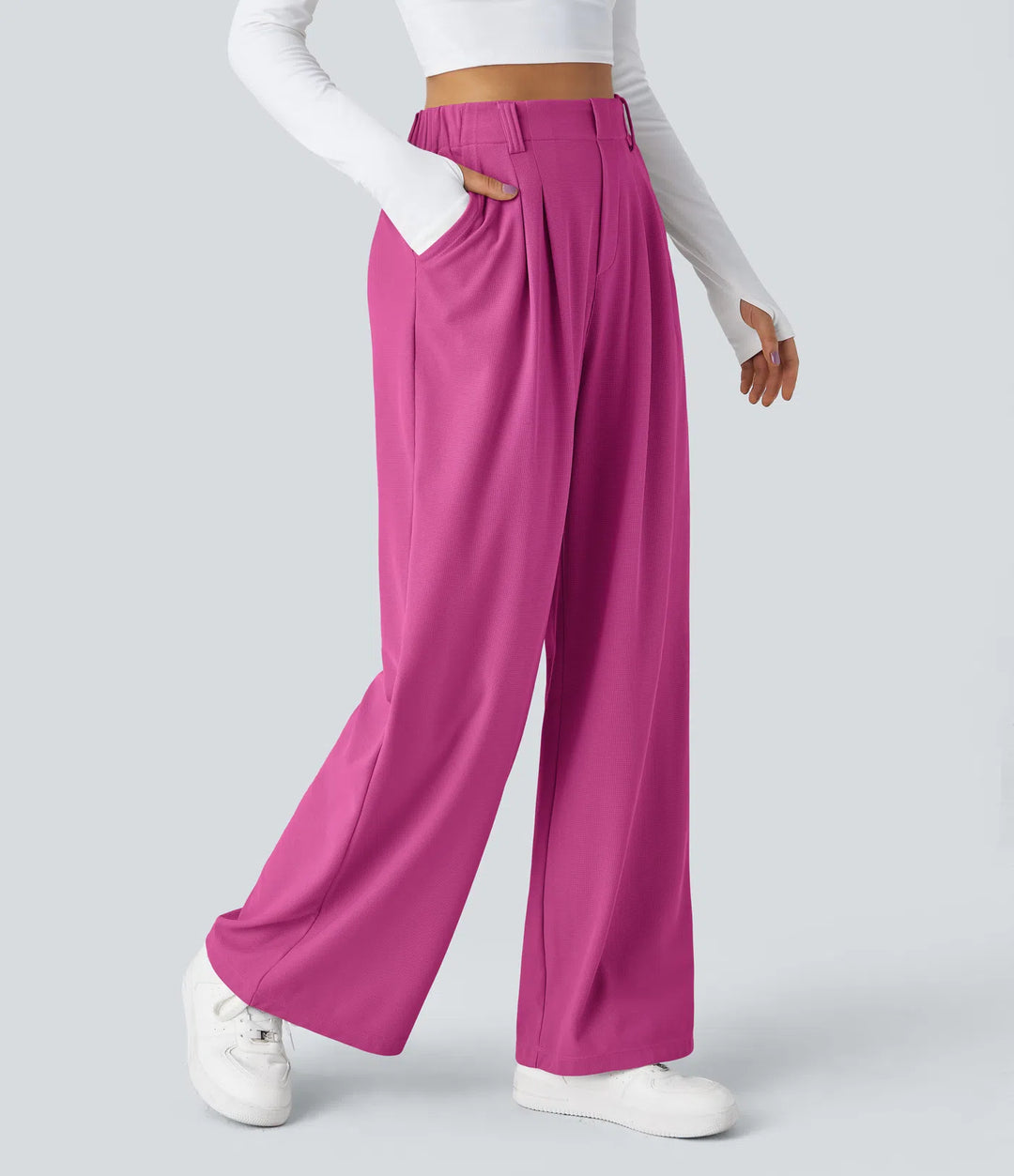 Pantalon fluide à taille haute et jambes larges, en tissu gaufré, avec poches latérales
