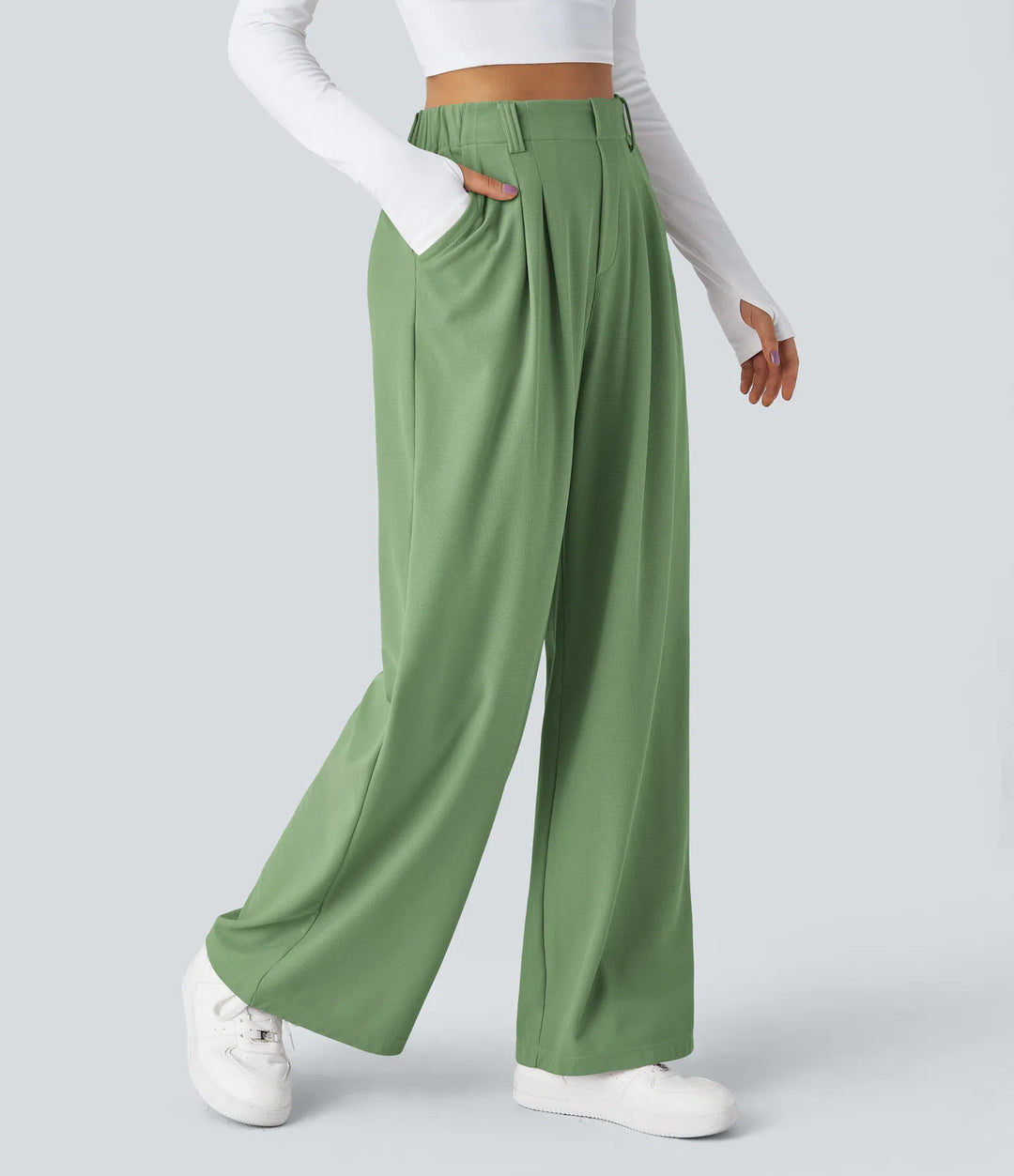 Pantalon fluide à taille haute et jambes larges, en tissu gaufré, avec poches latérales