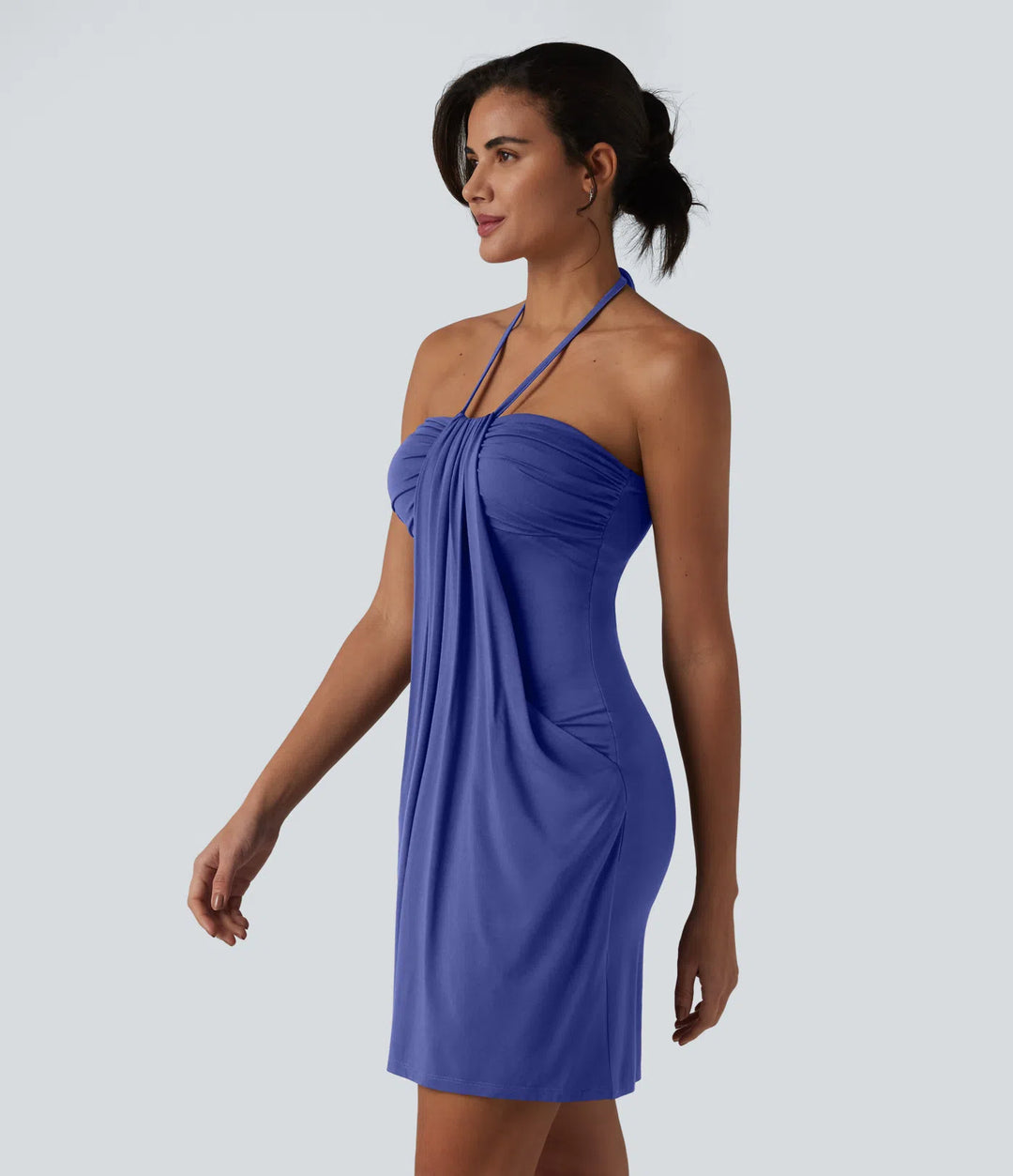 Robe resort mini dos nu à col licou avec lien noué dans le dos et poches