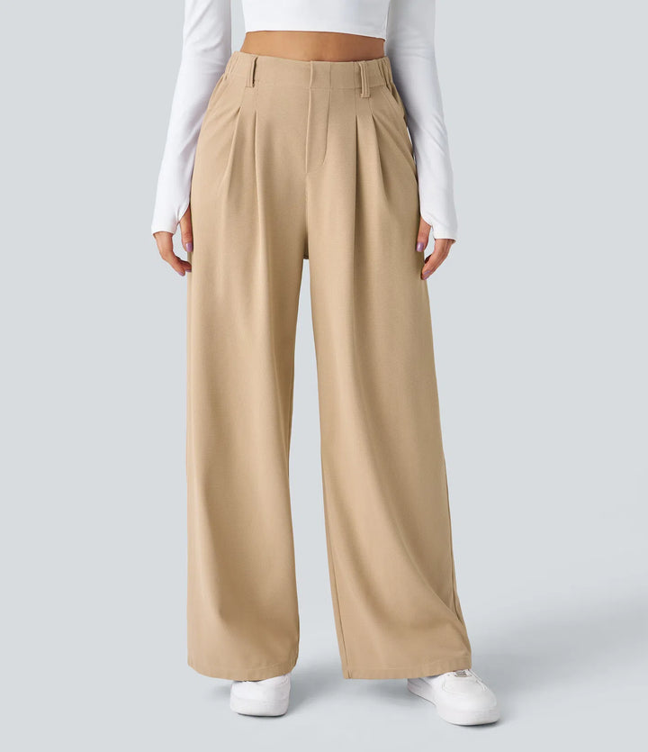 Pantalon fluide à taille haute et jambes larges, en tissu gaufré, avec poches latérales