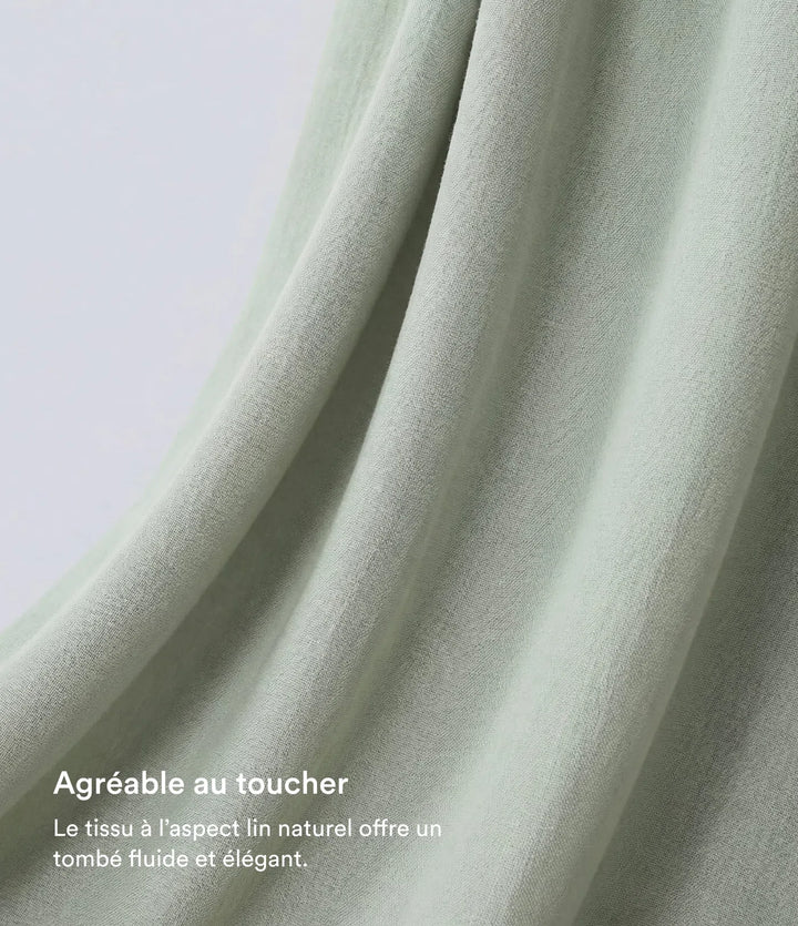 Pantalon large fluide taille haute avec cordon de serrage, poches latérales et aspect lin