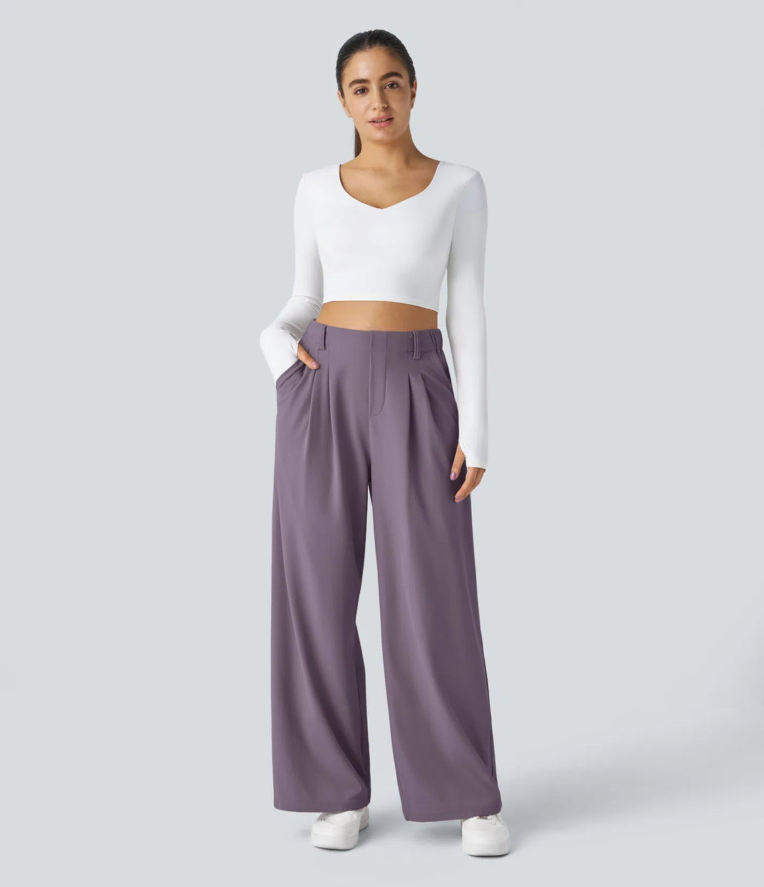 Pantalon fluide à taille haute et jambes larges, en tissu gaufré, avec poches latérales