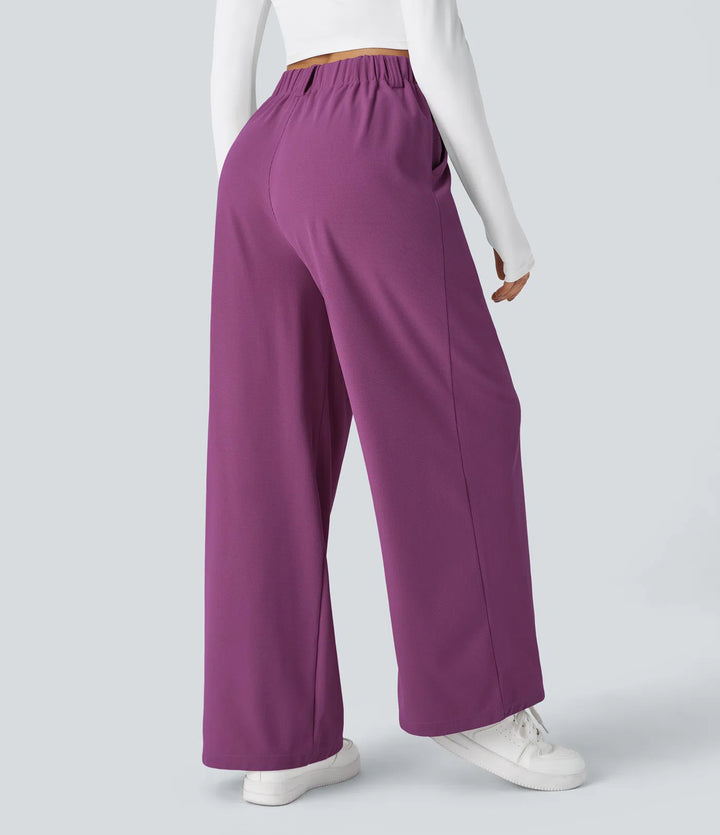 Pantalon fluide à taille haute et jambes larges, en tissu gaufré, avec poches latérales