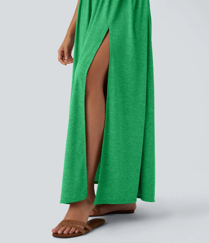 Robe longue fluide fendue avec poches latérales, dos nu et effet torsadé