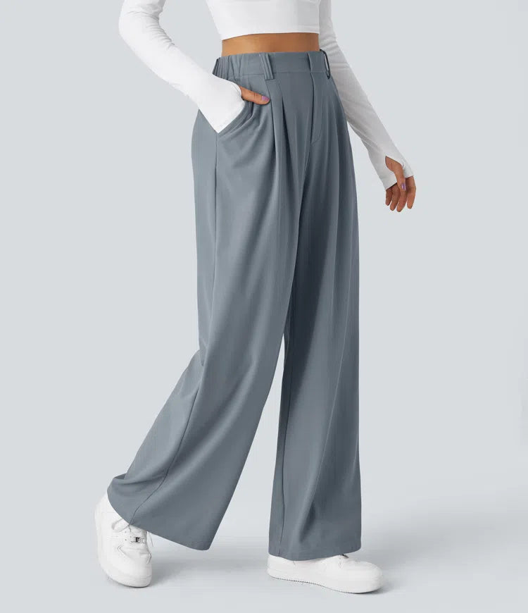 Pantalon fluide à taille haute et jambes larges, en tissu gaufré, avec poches latérales
