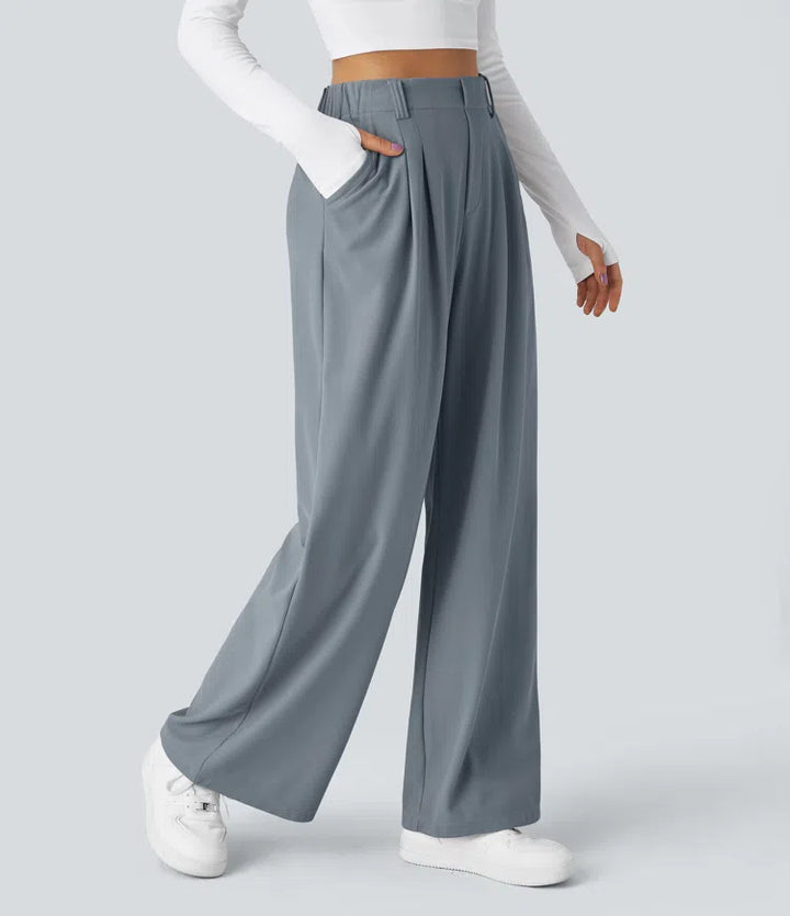 Pantalon fluide à taille haute et jambes larges, en tissu gaufré, avec poches latérales