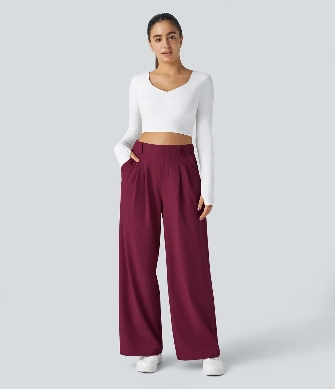 Pantalon fluide à taille haute et jambes larges, en tissu gaufré, avec poches latérales