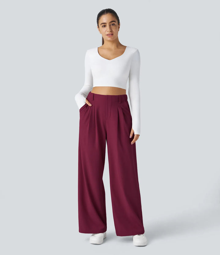 Pantalon fluide à taille haute et jambes larges, en tissu gaufré, avec poches latérales