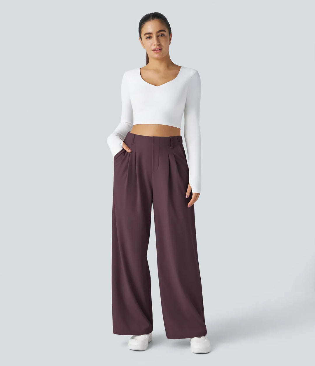 Pantalon fluide à taille haute et jambes larges, en tissu gaufré, avec poches latérales