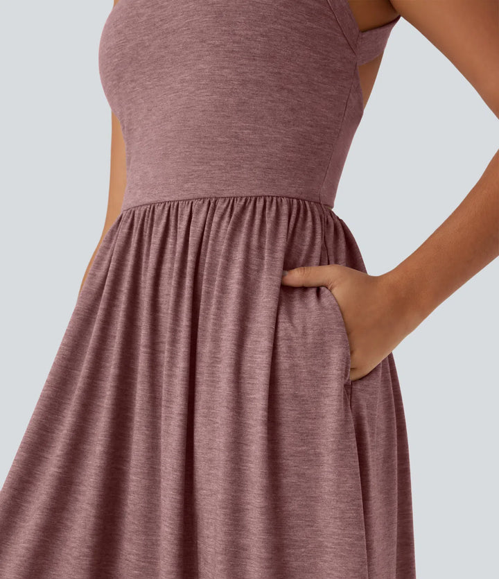 Robe longue fluide fendue avec poches latérales, dos nu et effet torsadé