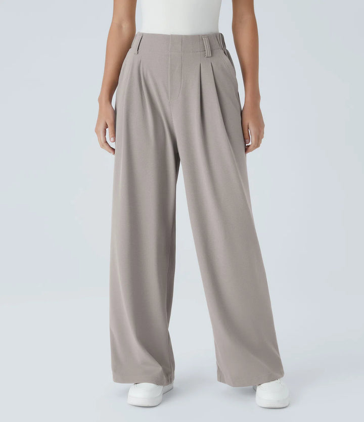 Pantalon fluide à taille haute et jambes larges, en tissu gaufré, avec poches latérales