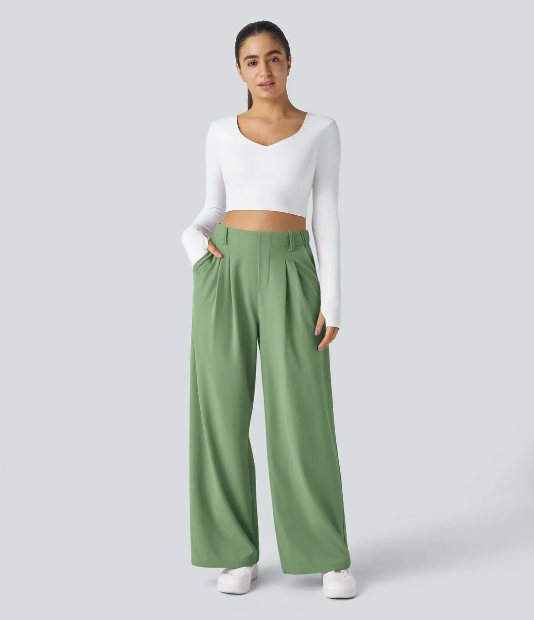 Pantalon fluide à taille haute et jambes larges, en tissu gaufré, avec poches latérales