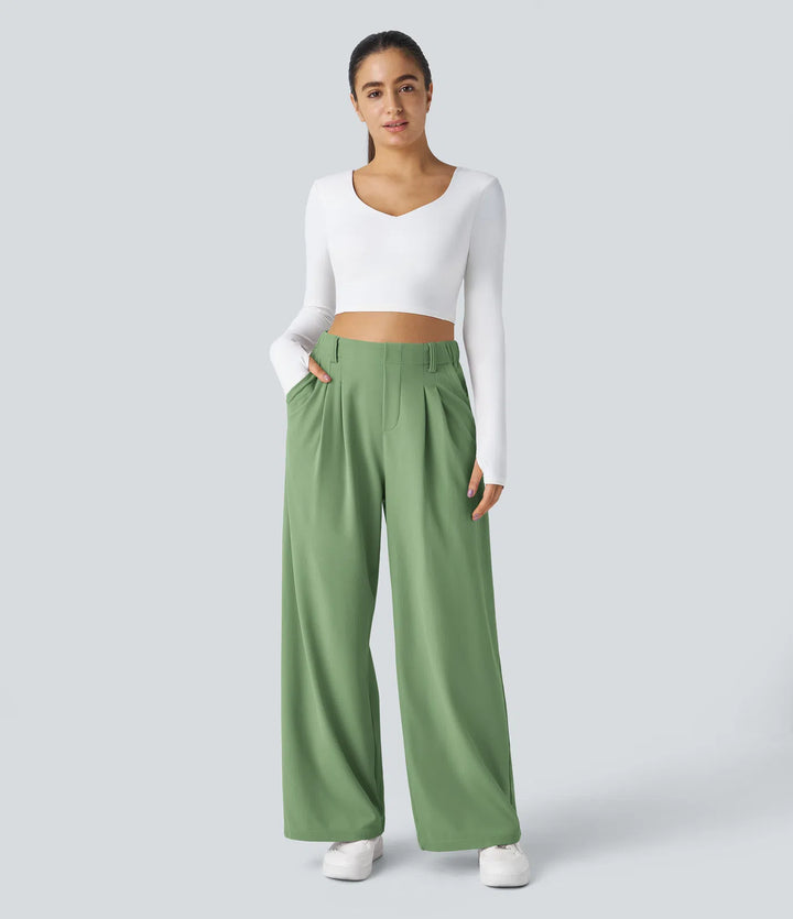 Pantalon fluide à taille haute et jambes larges, en tissu gaufré, avec poches latérales