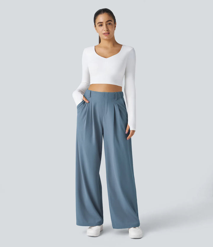 Pantalon fluide à taille haute et jambes larges, en tissu gaufré, avec poches latérales